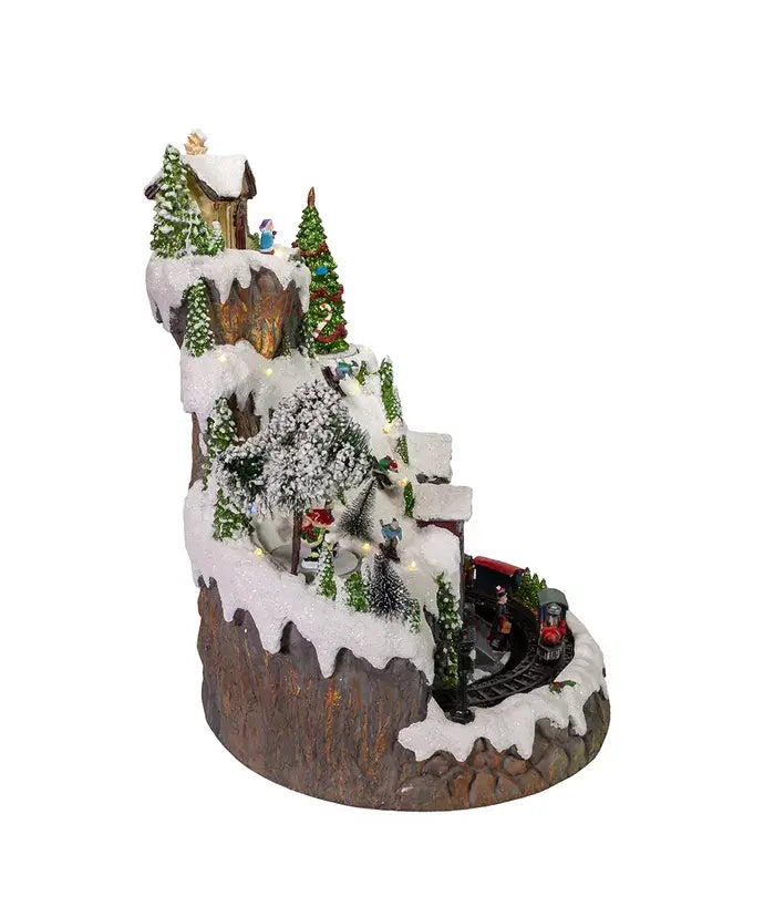 Kurt S. Adler, Inc. - 17"MUSICAL LED VILLAGE ON MTN TABLETOP