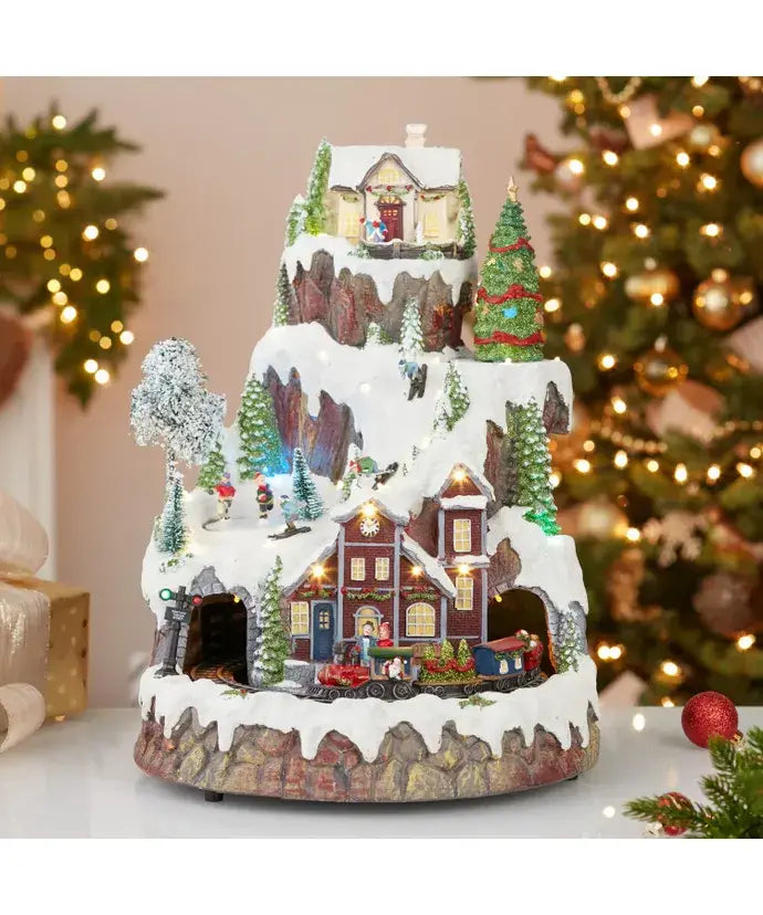 Kurt S. Adler, Inc. - 17"MUSICAL LED VILLAGE ON MTN TABLETOP