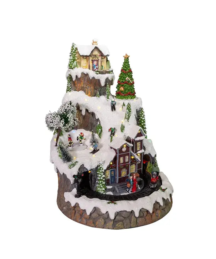 Kurt S. Adler, Inc. - 17"MUSICAL LED VILLAGE ON MTN TABLETOP