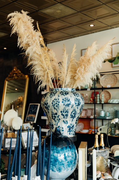 Elegant blue and white vase with dried pampas