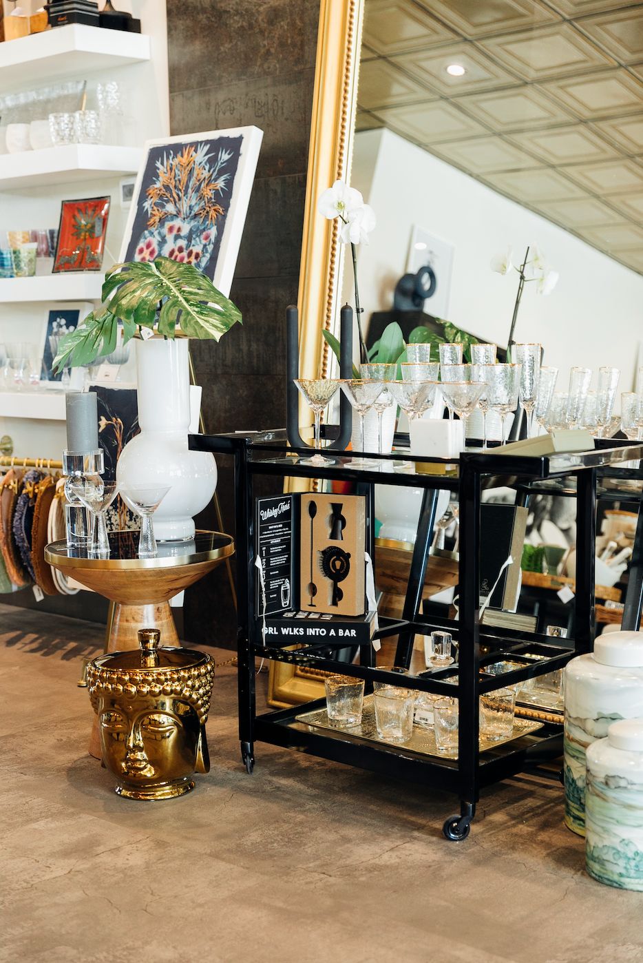 Bar cart with entertaining gifts and home goods at Black Tie Beach 