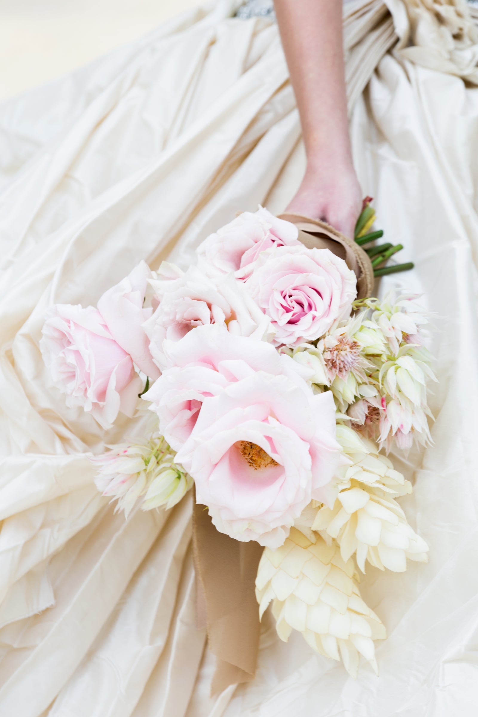 Bride holding pink and white bouquet